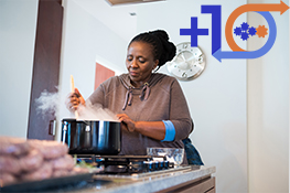woman cooking on a stove