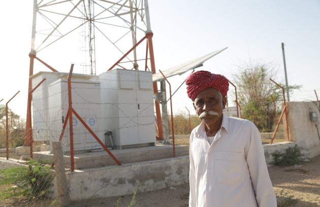 Person standing next to an energy storage