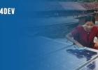 woman cleaning photovoltaic panel