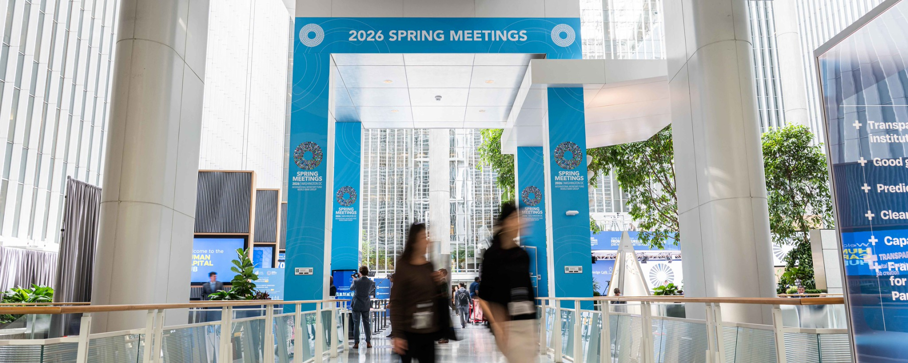 WORLD BANK GROUP HEADQUARTERS. 2026 IMF/ World Bank Group Spring Meetings. Photo: Ike Hayman / World Bank Blurry photo of people walking in a professional environment