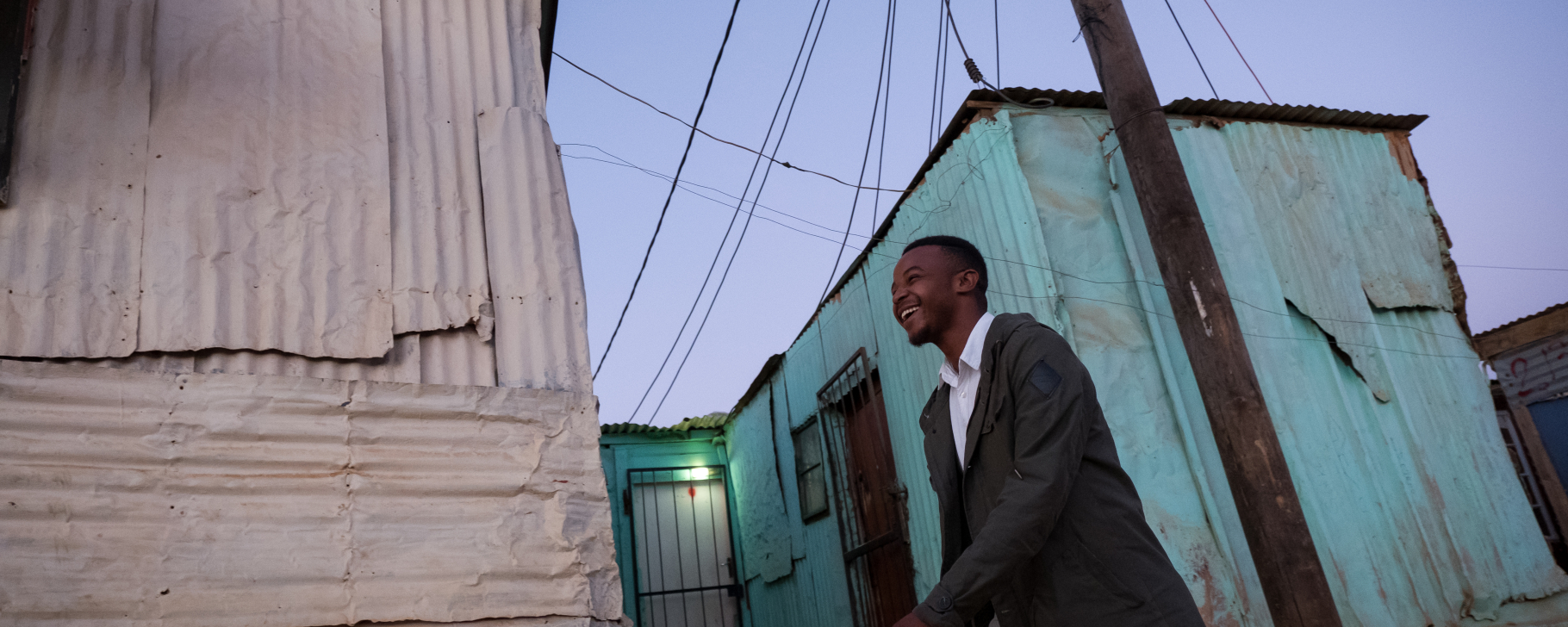 Person walking in a village