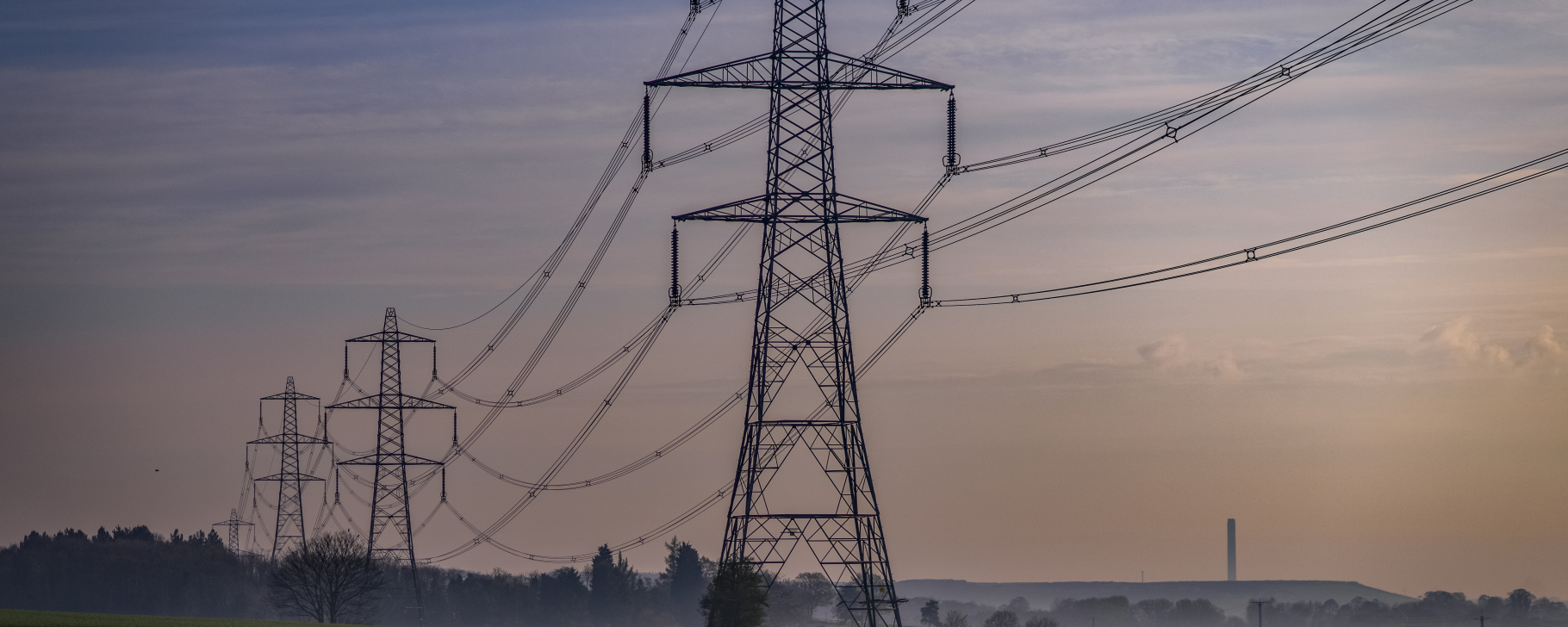Electricity Pylon with the cables over farmland