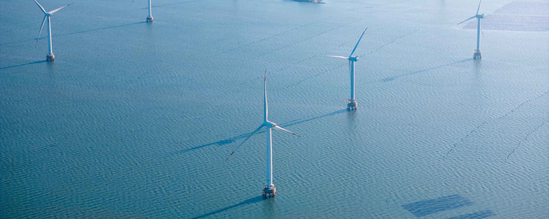 Aerial photography of wind turbines at sea 