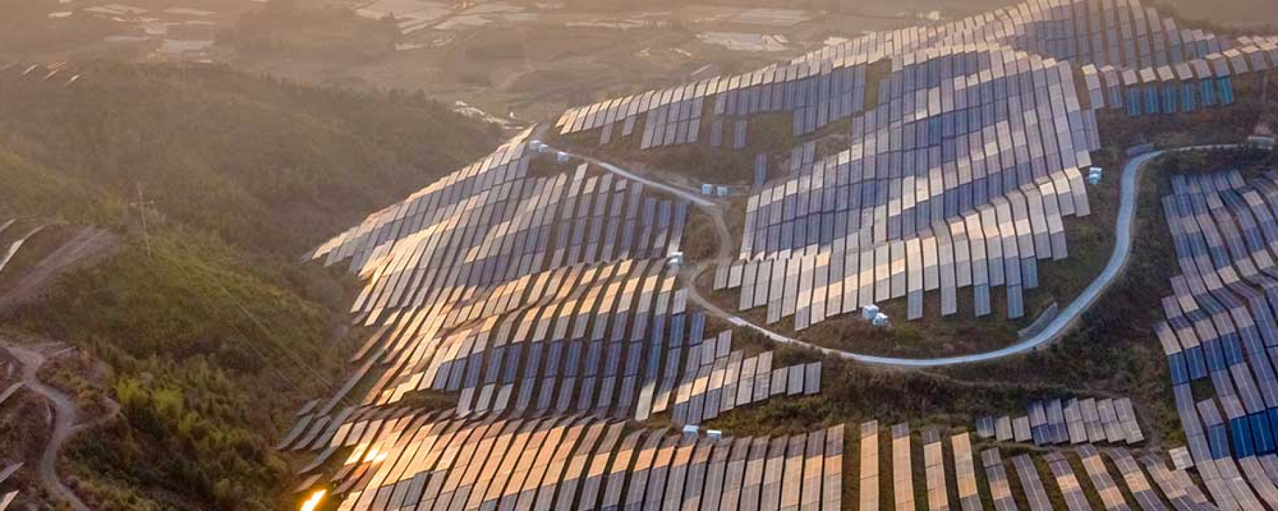 Solar panels covering the slopes of mountains