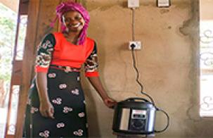 Electric Cooker woman, cooker, africa
