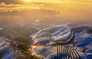 Enhancing Renewable Energy Tenders in Africa Massive parts of a mountainous region covered with solar panels