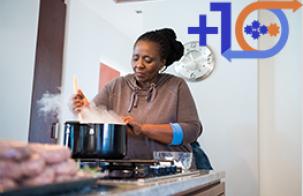 woman cooking on a stove