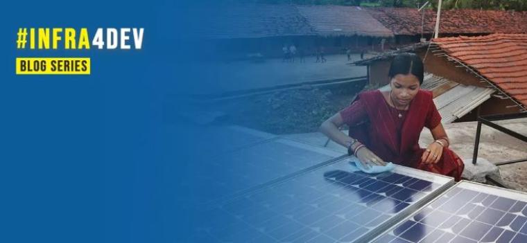 woman cleaning photovoltaic panel