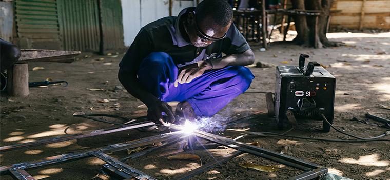Mini Grids for Half a Billion People: Market Outlook and Handbook for Decision Makers Kenya, welder