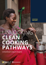 woman using improved cookstove