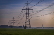 Electricity Pylon with the cables over farmland